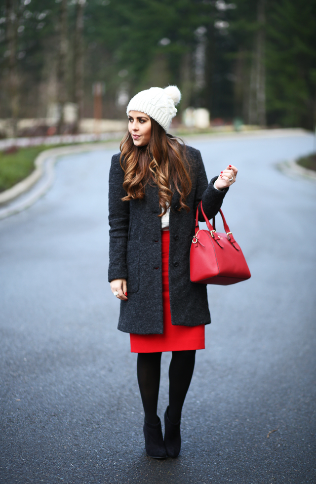 white pom beanie red skirt